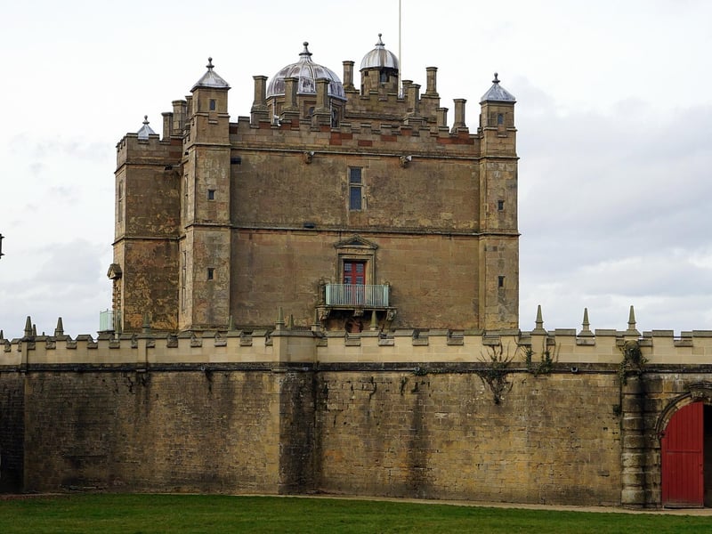 Bolsover Castle is a stunning place to explore history in Derbyshire. Set on a hilltop, the castle offers incredible views of the Derbyshire countryside. Inside the beautifully restored building, you can enjoy the wall art, marble fireplaces, and stunning painted ceilings.