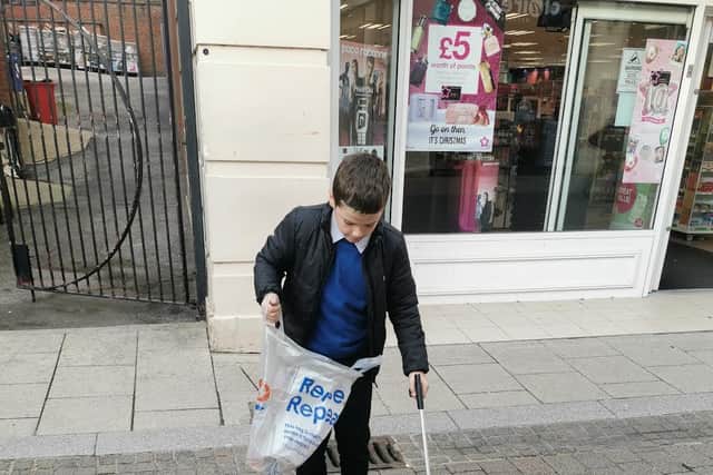 After a trip into the town centre, Oscar wanted to return to clear litter from the streets.