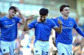 All smiles from Dilan Markanday, Louie Marsh and Lee Bonis on an impressive day against Tranmere Rovers