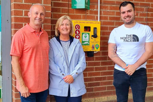 Pictured with Wingerworth's new defibrillator are, l-r, Tom Henson's father Shaun O'Halloran, Tom's mother Nikki O'Halloran and nurse Matt Tacey.