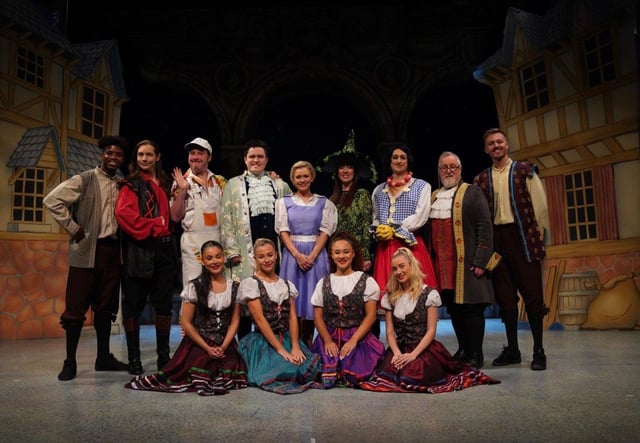 Suzanne Shaw with the cast of Beauty and the Beast on the panto set at Chesterfield Pomegranate Theatre.