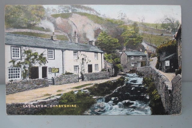 The stream runs between the pretty village cottages in Castleton.