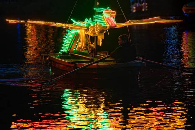 Parade of boats lights up the River Derwent.