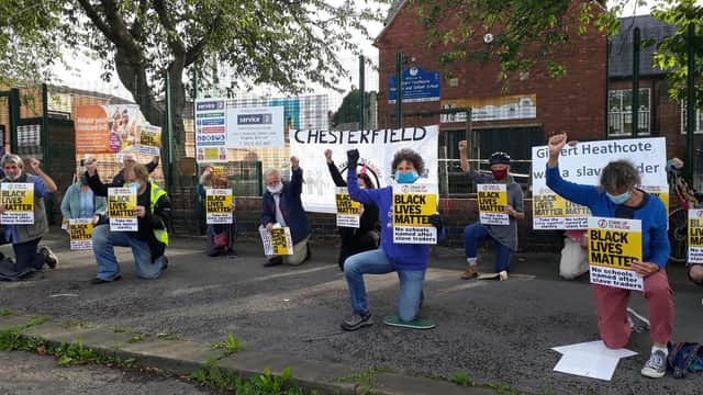 Members of Stand Up to Racism Chesterfield and North Derbyshire during their protest at what was formerly known as Gilbert Heathcote Primary School