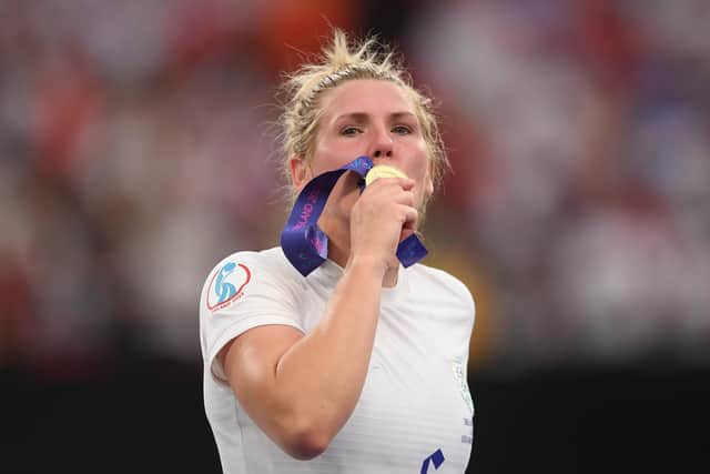 Derbyshire's Millie Bright kisses her winners medal following the UEFA Women's Euro 2022 final match between England and Germany at Wembley Stadium