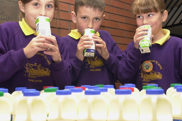 Pupils Amy Sayles, aged nine, Jack Parker, aged seven, and Chelsea Walsh, aged seven, drink the milk provided free by Asda