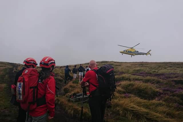 An air ambulance landed on Grindslow Knoll over the weekend to take an injured walker to hospital. Credit: Edale Mountain Rescue Team.
