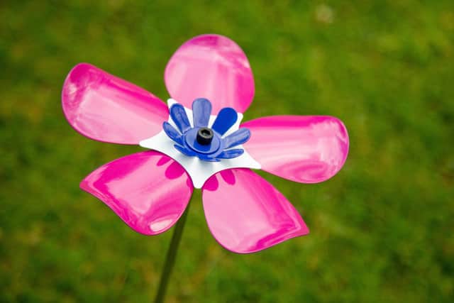 This year the striking stainless-steel flowers are pink and each measure 45cm in length, having been made by the British Ironwork Centre