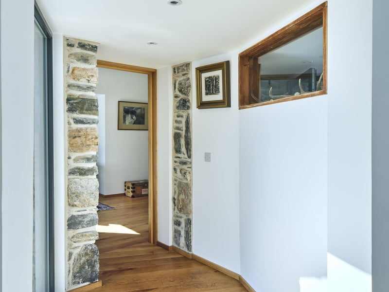 Exposed stonework and oakfloors