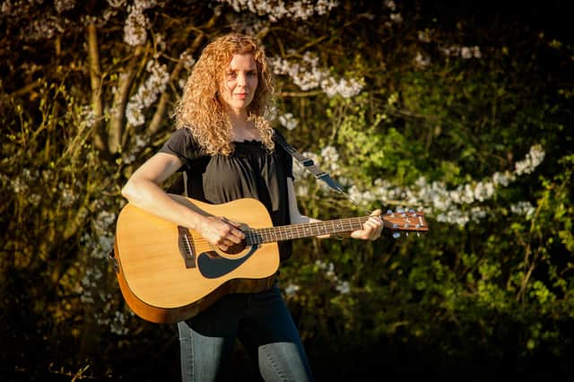 Jenny Watson who runs Broomhill Farm Luxury Dog Hotel in Old Whittington has written a song for separated families during the coronavirus pandemic.  Picture by James Watson.