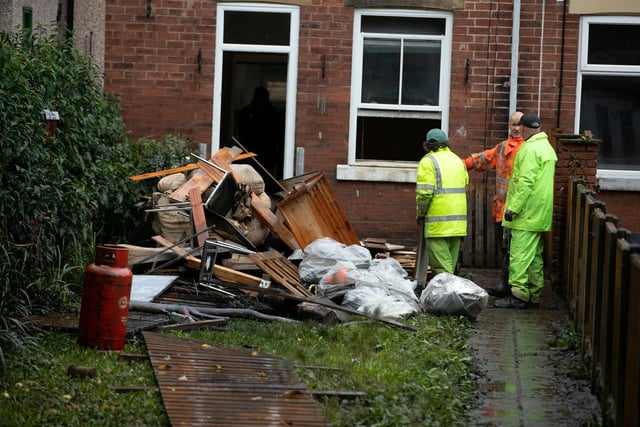 The aftermath of Storm Babet leave residents at Tapton Terrace clearing out destroyed houses