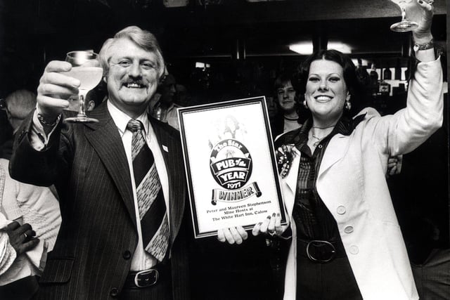 Peter and Maureen Stephenson,in a  festive mood after The White Hart, at Calow, was named Pub of the Year in 1977