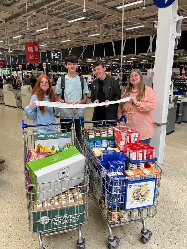 Derry Duffus, Harry Lockwood, James Kenny and Gracie Heath with their food shop for Chesterfield Foodbank