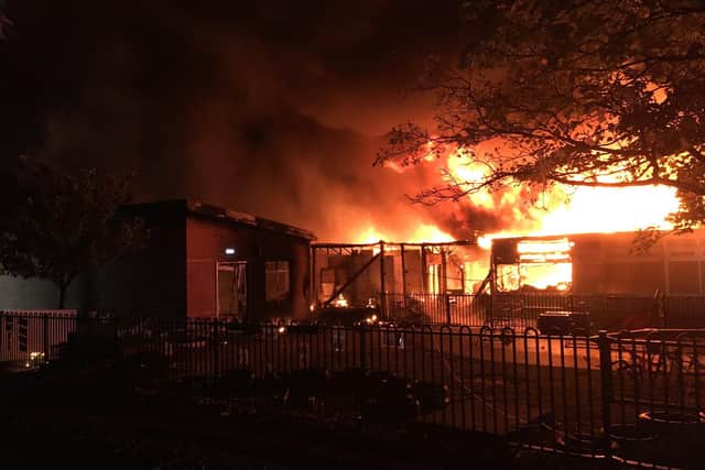 The blaze caused "extensive damage", destroying most of the infant school, according to Derbyshire Fire and Rescue Service.