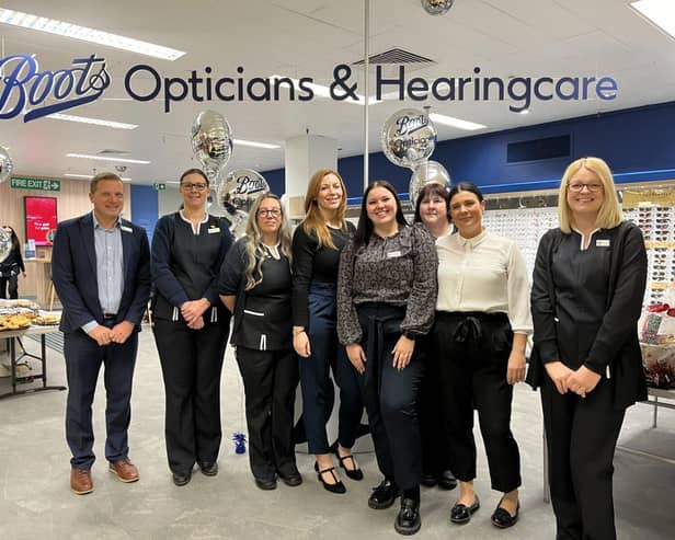 Boots Opticians Chesterfield team posing in front of their newly refit store