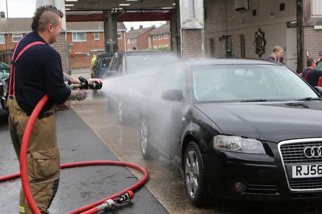 Shirebrook Fire Station's charity car wash was doing brisk business on Saturday morning