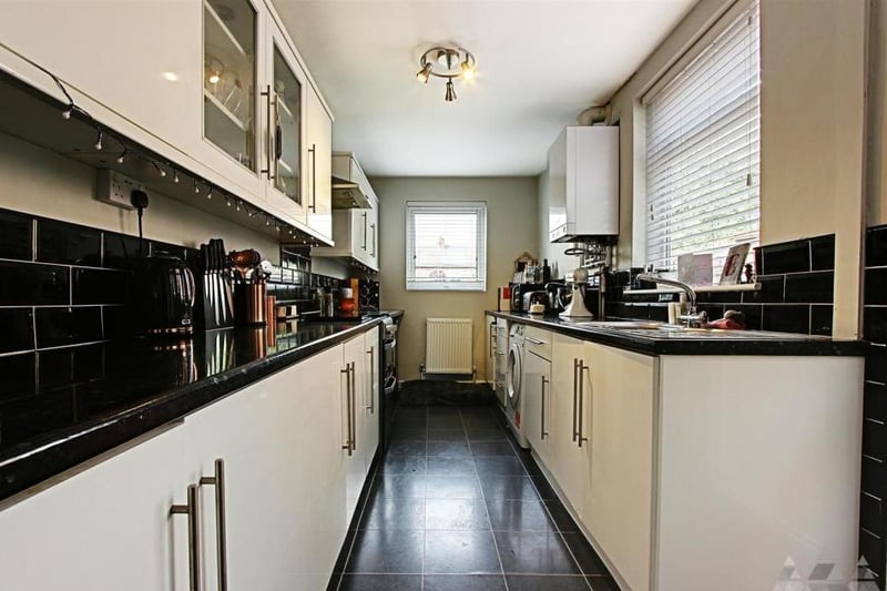 A fitted kitchen boasts all the modern amenities. It is bright and well presented, and has a door giving access to the garden.