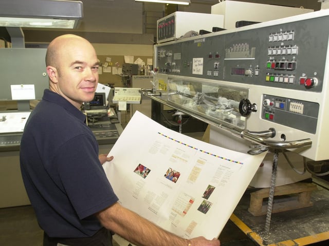 Nick Short working on the Komori 540 B1 Press at  Slater Printing
