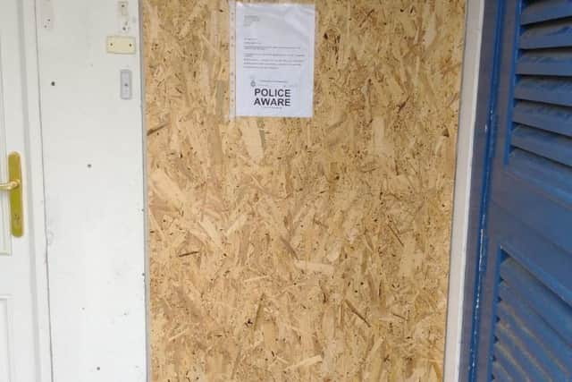 Police boarded up the door to prevent lodgers from returning yesterday (March 23).