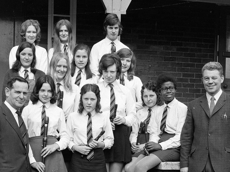 Mansfield's Ravensdale School's recorder group. Headteacher Hans Tuchler, left, and music teacher Mr Simpson, right.