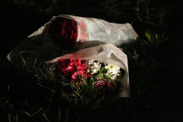 Floral tributes were left at the scene of the tragedy.