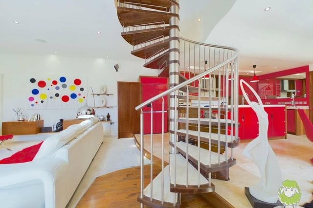A magnificent spiral staircase in the open-plan space leads to the first floor of the unique £470,000 Mansfield property.