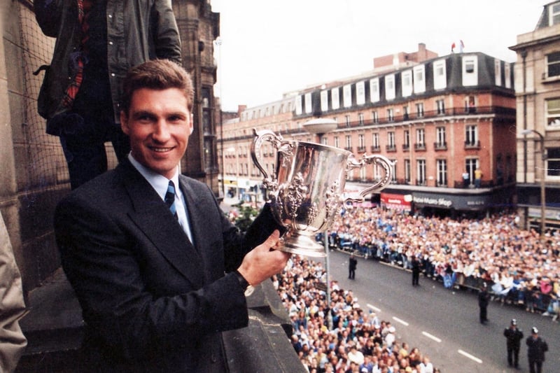 Nigel Pearson shows off the League Cup to Owls fans at Sheffield Town Hall.