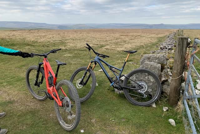 A dark blue with distinctive gold seat post and fork ‘Specialized Stuntjumper Pro’ electric bike and a bright red ‘Specialized Turbo Levo’ mountain bike were taken during the incident.