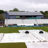 Covers are pictured over the crease due to poor weather prior to the LV= Insurance County Championship match between Derbyshire and Durham at The Incora County Ground on Friday. (Photo by Alex Pantling/Getty Images)