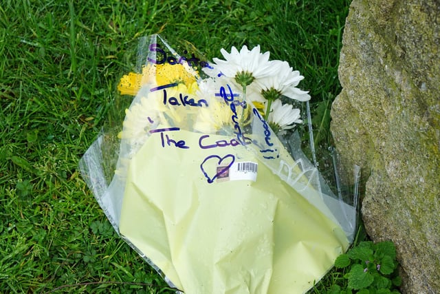 A floral tribute was left near the property.