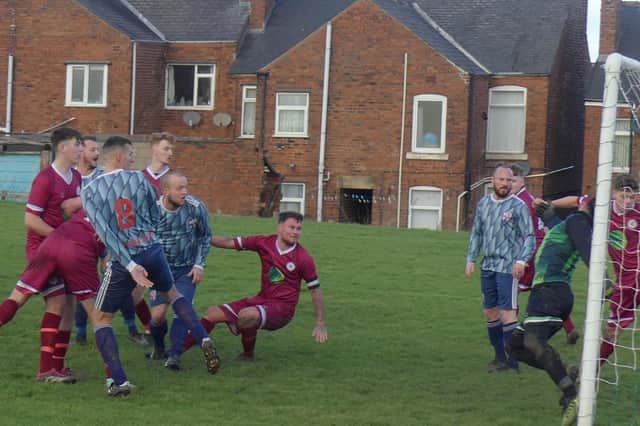 Derbyshire Cup action between Hepthorne Lane and Shirebrook Soldiers. Hepthorne's opening goal is scored by Matt Edinboro. All photos by Martin Roberts.