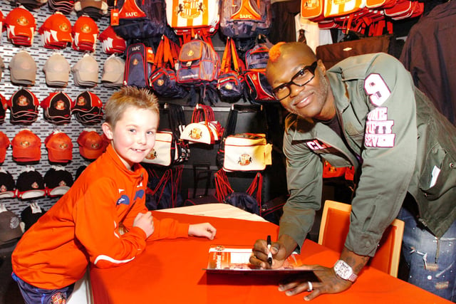 Tom Carr, 9, gets to meet Djibril Cisse at the Stadium of Light club shop in 2008.