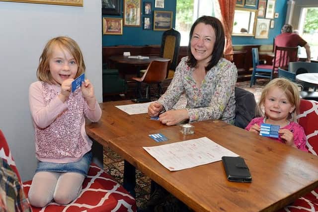 Emily and Rose enjoyed a meal out with mum Nicola Wall in the Pig and Pump.