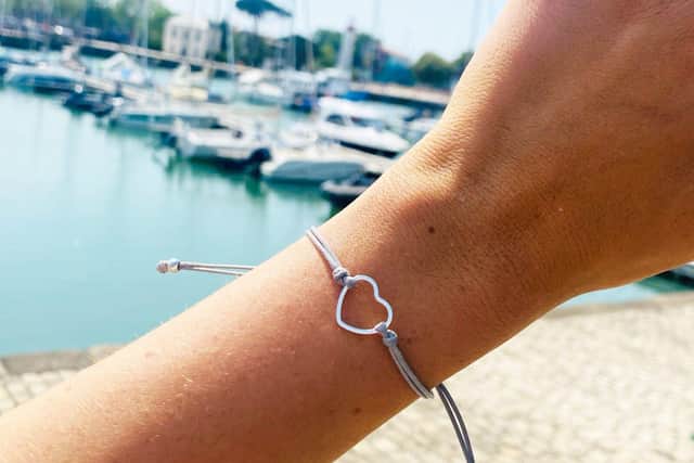Heart-shaped wish bracelet a permanent reminder for a beloved pet. Image: Poppy PR