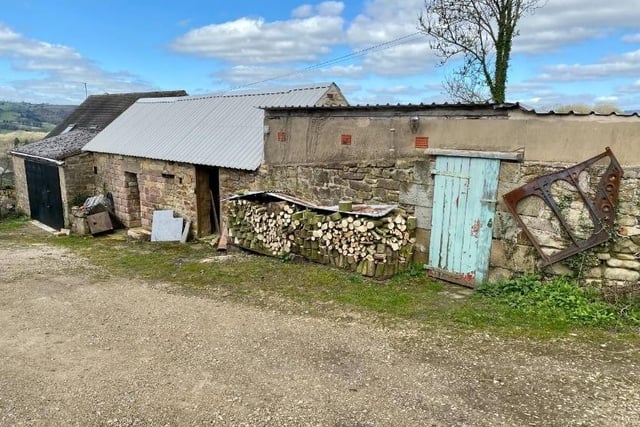 Stone-built outbuildings including stable, store, top shed and log store could be developed as residential accommodation, subject to planning permission.