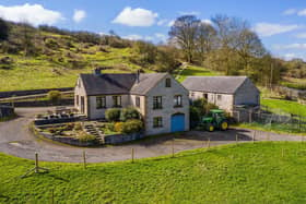The farmhouse was built in 1979 and is clad in stone and has a tiled roof. Planning permission is in place to convert the traditional building adjacent to the farmhouse into a two-bedroom cottage.