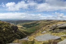 A view from Kinder Scout looking over Kinder Reservoir to the surrounding countryside and cities beyond (photo: National Trust Images/Paul Harris).