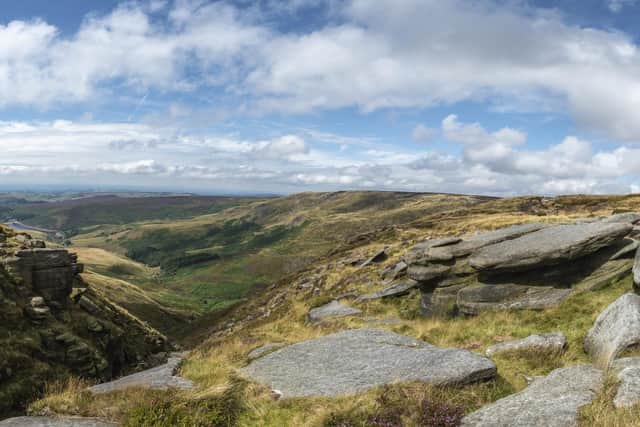 A view from Kinder Scout looking over Kinder Reservoir to the surrounding countryside and cities beyond (photo: National Trust Images/Paul Harris).