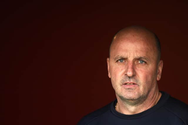 Chesterfield manager Paul Cook will take his team to Dorking Wanderers on the opening day of the new season.