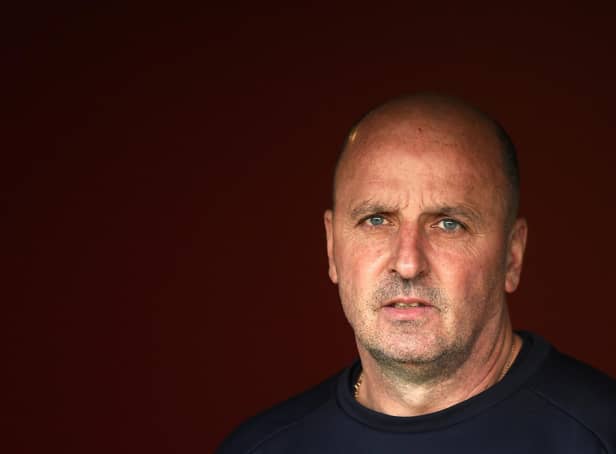 Chesterfield manager Paul Cook will take his team to Dorking Wanderers on the opening day of the new season.