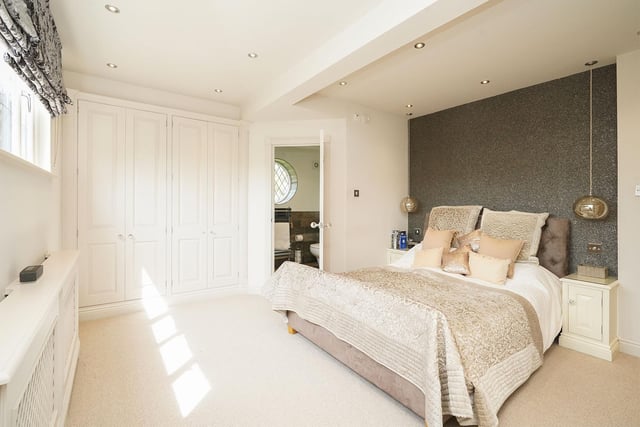 This bedroom is marked as "Bedroom 1" on the floorplan and it is beautiful with loads of wardrobe space and a spectacular en-suite bathroom.