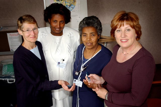 Two Ethiopian nurses were at the Diabetes Centre within the Hallamshire Hospital for a month to learn skills in diabetes in 2004. Left to right, diabetes specialist nurse Pam Sparks, sister Alemtsehay Yigezu Haile, sister Mintewab Fekadu Wassie and diabetes specialist nurse Elizabeth Fairclough using a blood glucose meter.