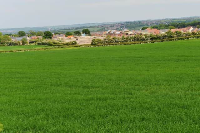 The building company behind a controversial 500 homes development planned for these green fields on the edge of Chesterfield has issued a statement.