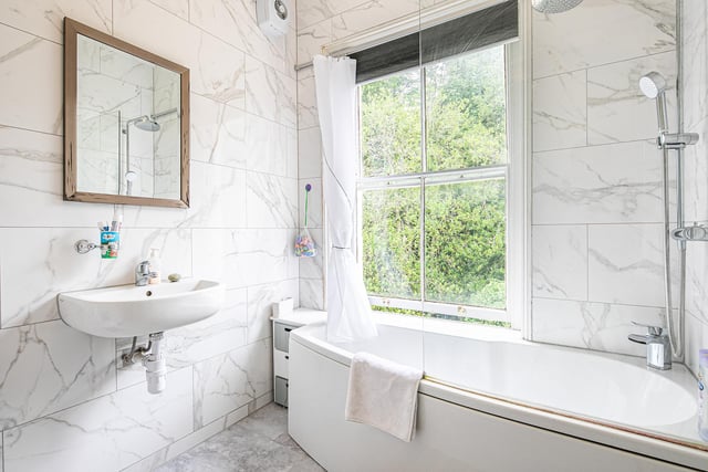 This is one of the two bathrooms - the corner tub maximises the space available.