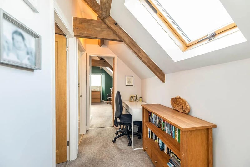 This is really useful space with the current owners using this as a work from office. Having original wooden framed windows on the rear wall and a velux window to the ceiling, 
having exposed beams and storage cupboard.