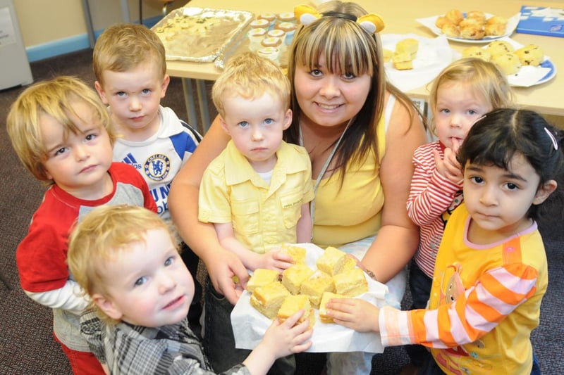 Raising money for Children in Need by selling cakes at Primrose Childrens Centre in 2009. Can you spot someone you know?