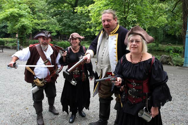 Stephen Fishpool, Rosemary Willis, Nick Harrison, and Melanie Fishpool form a right motley crew at the Pirate Mutiny.