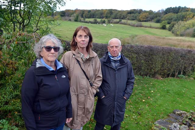 Wolds action group members Julie Atkin and Heather Clifton-Smith with Dr Stephen Martin. Campaigners say the proposed development near Matlock will cause flooding, traffic problems and the loss of wildlife.