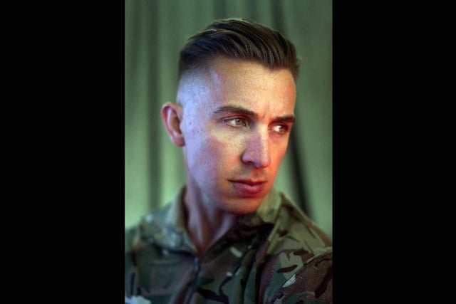 Corporal Alex Morris of the Royal Logistics Corps sits for a portrait. This image won the Student of the Year Award. By Marine James Clarke