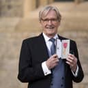 William Roache, pictured, after being made an OBE.
